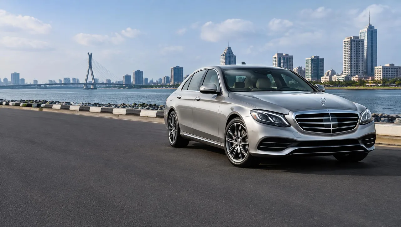 Silver executive sedan beside the waterfront